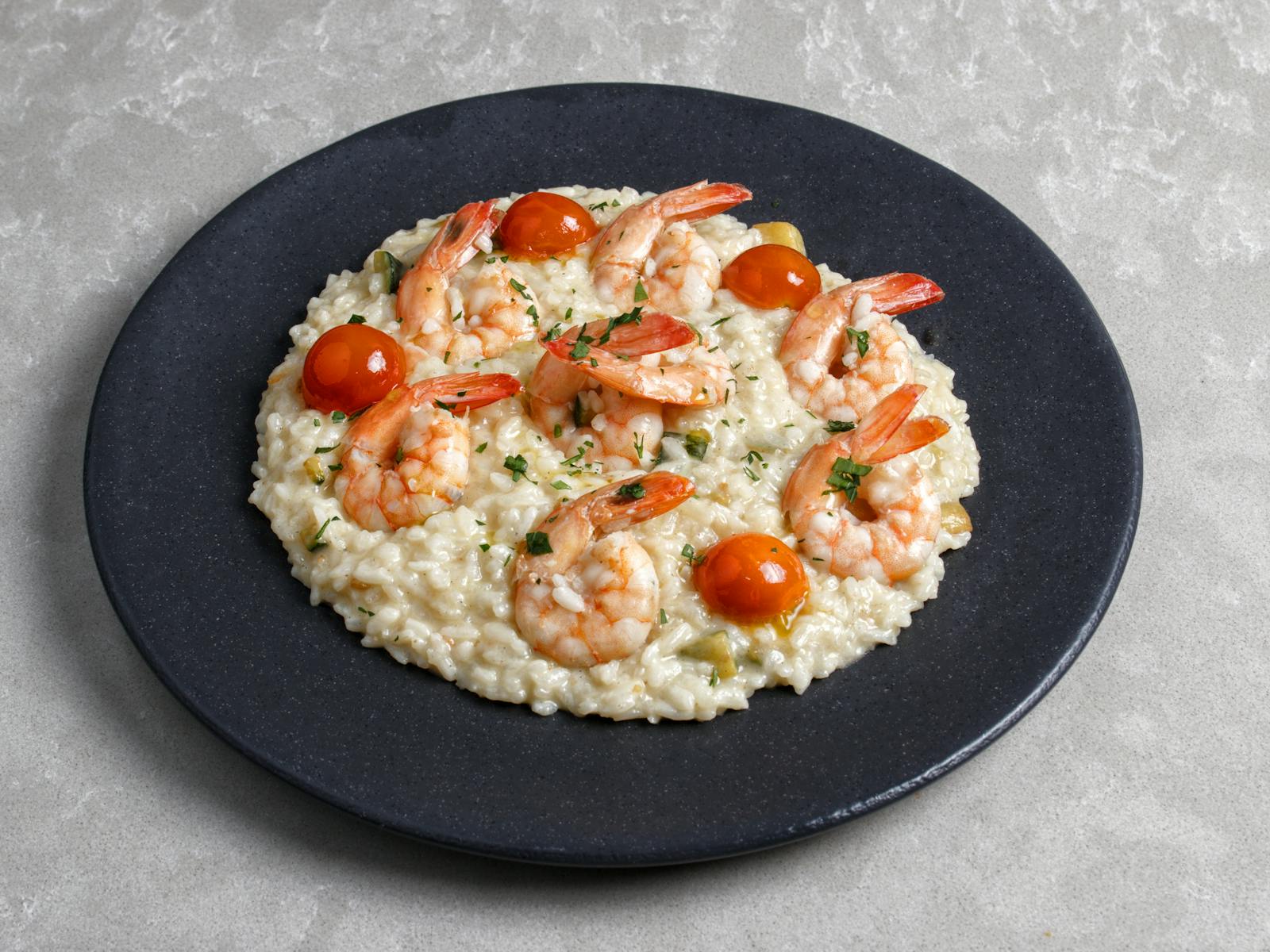 Risotto with braised leeks, pink prawns and saffron